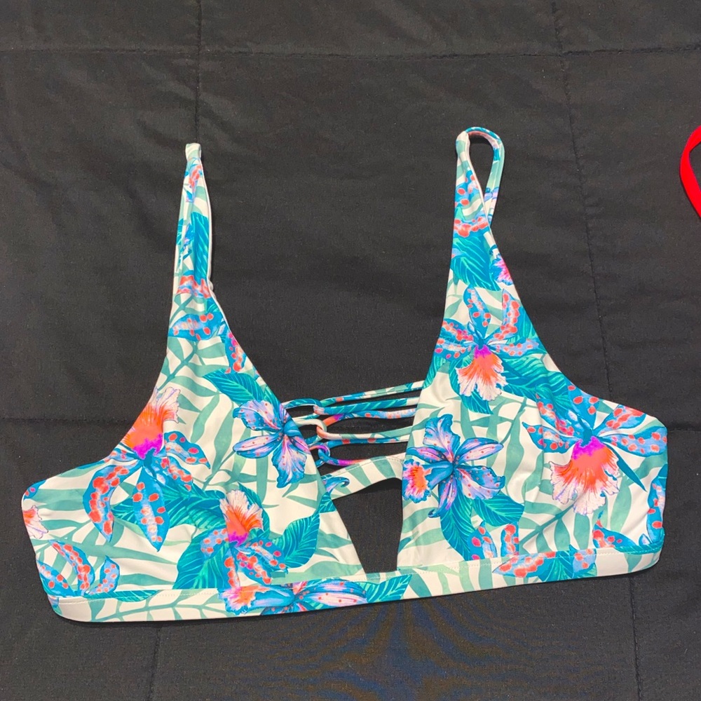 Floral jungle themed rip curl bikini top with adjustable straps